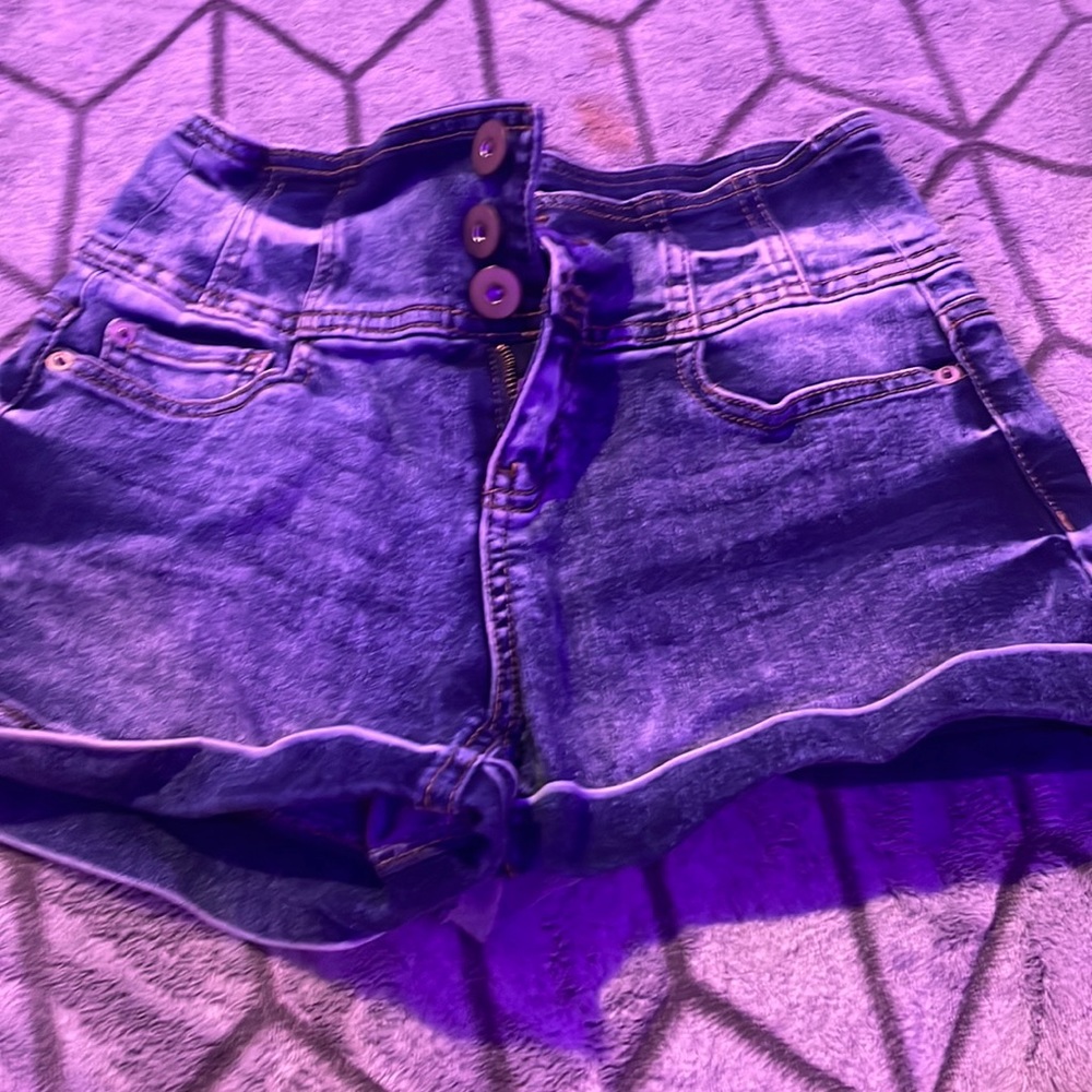 blue jeans with white patches